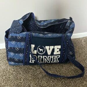 PINK blue duffle bag.